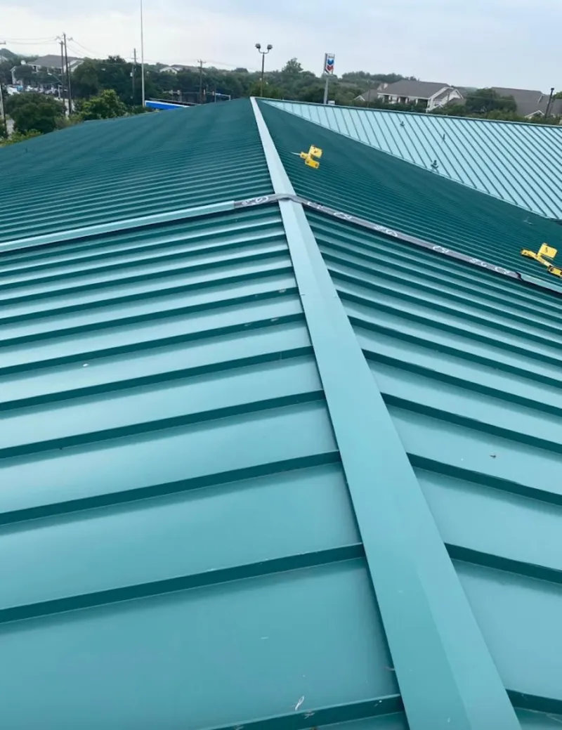 Green commercial metal roof ridge and valley for Metal Roof Repair in Duncanville