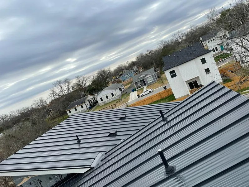 Standing seam metal roof panels with vents for Skylight Repair in Duncanville